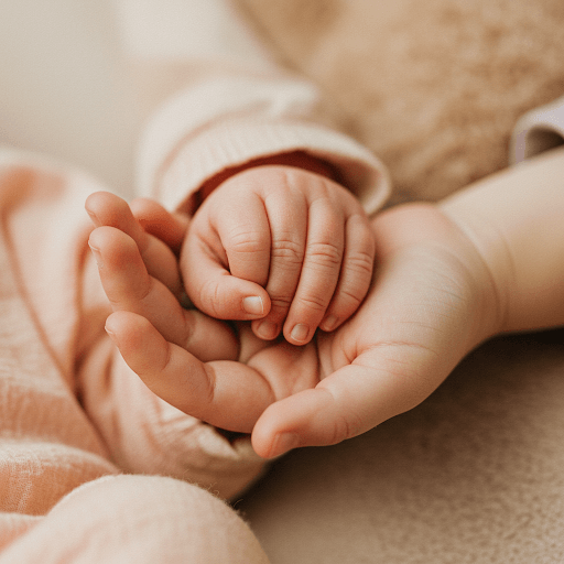 Nurturing Sibling Relationships: Newborn hand touch