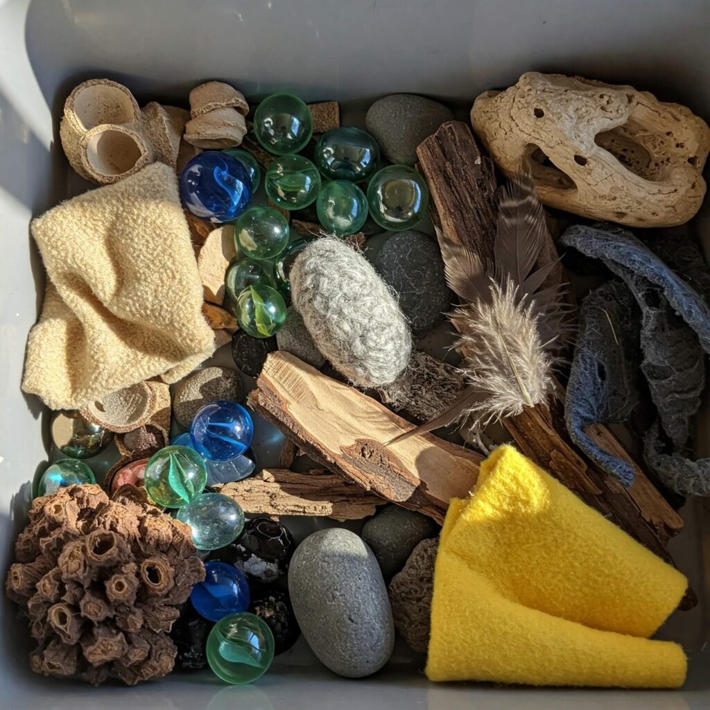 Toddler exploring a sensory bin.