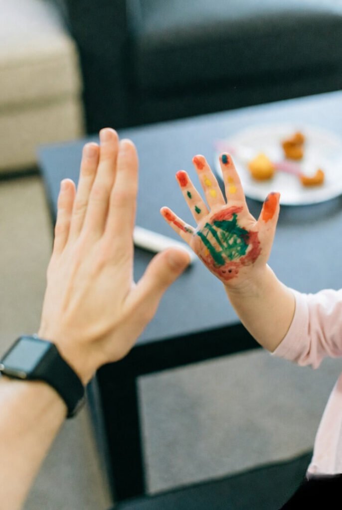 Kid's colorful hands, epic high-five